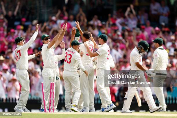 Mitchell Starc of Australia celebrates the wicket of Abdullah Shafique of Pakistan during day three of the Men's Third Test Match in the series...