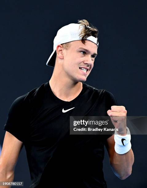 Holger Rune of Denmark celebrates after winning a point in his match against James Duckworth of Australia during day six of the 2024 Brisbane...