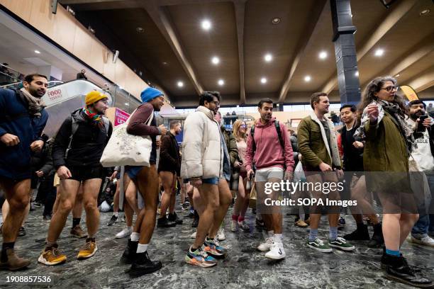 No Trousers Tube Ride" participants without pants dance at Euston Station Participants in the "No Trousers Tube Ride" were seen nonchalantly riding...