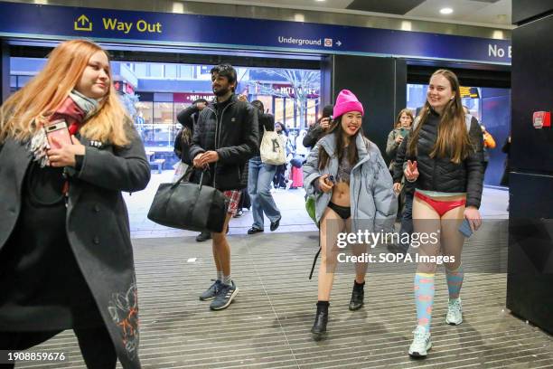 Participants take part in the annual "No Trousers Tube Ride" event on the London Underground. During the annual event, "No Trousers Tube Ride",...