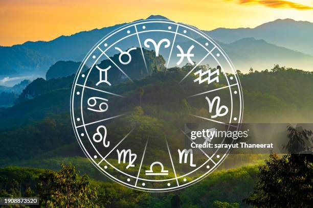 zodiac signs inside of horoscope circle. astrology in the sky with many stars and moons astrology and horoscopes concept - zodiac earth sign stock pictures, royalty-free photos & images