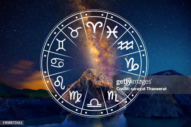zodiac signs inside of horoscope circle. astrology in the sky with many stars and moons  astrology and horoscopes concept - the archer stock pictures, royalty-free photos & images