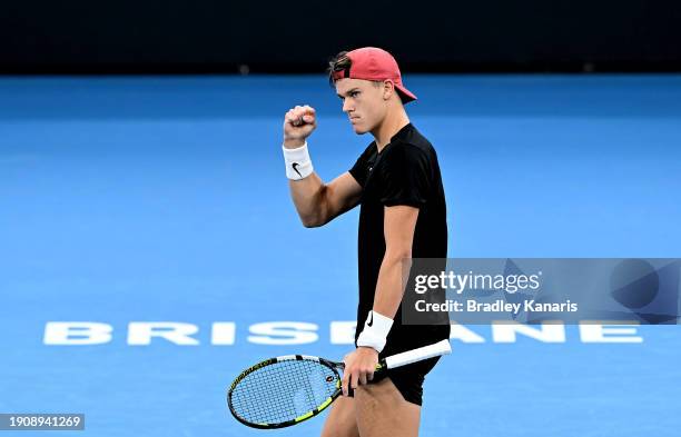 Holger Rune of Denmark celebrates after winning a point in his match against James Duckworth of Australia during day six of the 2024 Brisbane...