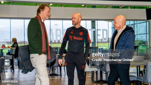 Sir Jim Ratcliffe and Sir Dave Brailsford of INEOS meet Manager Erik ten Hag of Manchester United in the staff restaurant at Carrington Training...