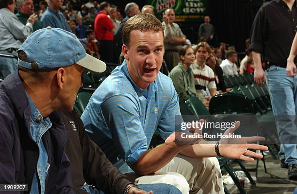 Quarterback Peyton Manning of the Indianapolis Colts talks to his head coach Tony Dungy as the Indiana Pacers host the Sacramento Kings at Conseco...
