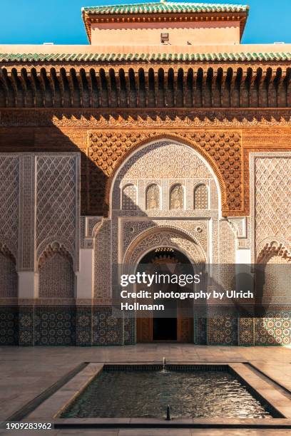 courtyard of ben youssef madrasa , marrakesh, morocco - vintage embellishment stock pictures, royalty-free photos & images