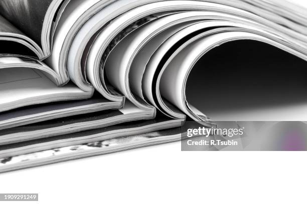 stack of magazines on white background - advertising column stock pictures, royalty-free photos & images
