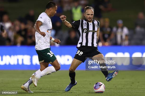 Valere Germain of Macarthur FC and Dane Ingham of the Jets compete for the ball during the A-League Men round 11 match between Macarthur FC and...