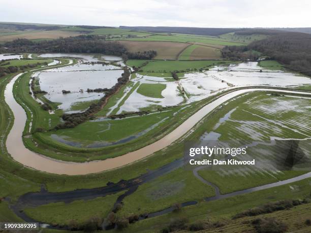 In this aerial view, floodwater on fields after the River Cuckmere burst its banks on January 05, 2024 in Alfriston, United Kingdom. Days of heavy...