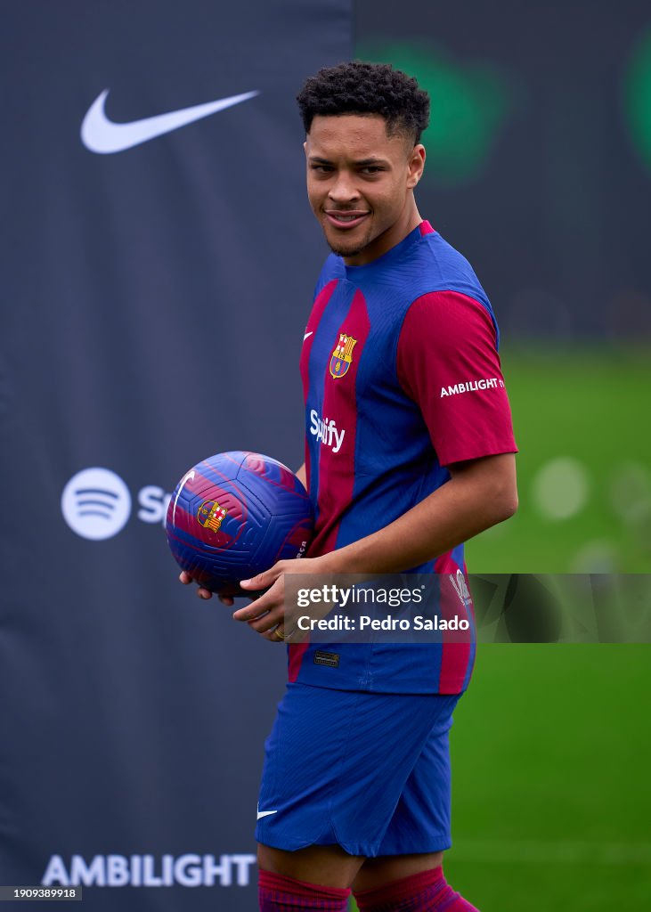 Victor Raro Que Vitor Roque poses for a photo during his unveiling as a new FC... News ...