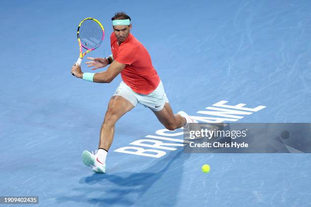 Rafael Nadal of Spain plays a backhand in his match against Jordan Thompson of Australia during day six of the 2024 Brisbane International at...