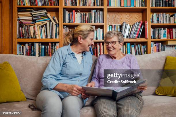 remembering old times - memory book stock pictures, royalty-free photos & images