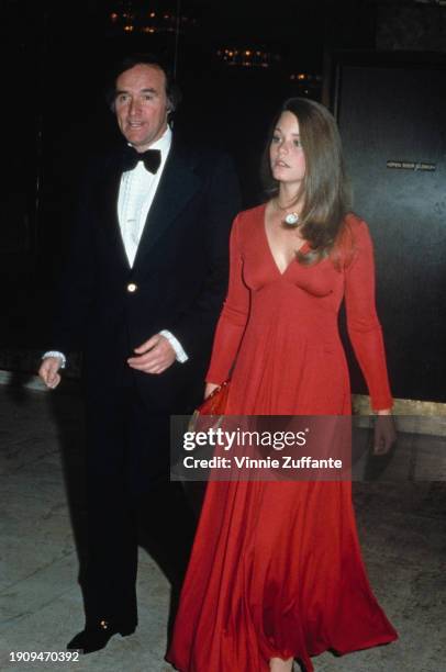 American talent manager Lenny Hirshan, wearing a tuxedo and bow tie, with American actress Susan Dey, who wears a full-length long-sleeved dress,...