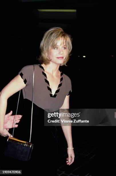 American actress Susan Dey, wearing a black-and-grey outfit, attends the 49th Golden Globe Awards, held at the Beverly Hilton Hotel in Beverly Hills,...