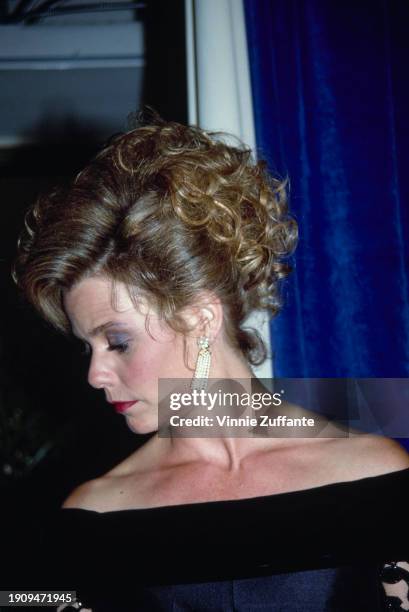 American actress Susan Dey, wearing a black off-shoulder outfit with tassel drop earrings, attends the 1991 Primetime Emmy Awards, held at the...