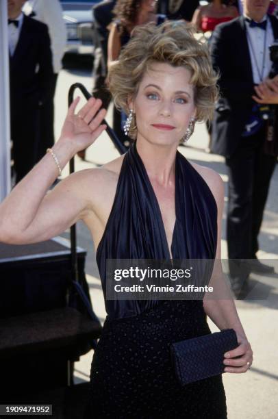 American actress Susan Dey, wearing a black halterneck dress with a plunging neckline, attends the 44th Primetime Emmy Awards, held at the Pasadena...