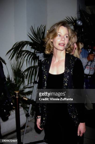 American actress Susan Dey, wearing a black outfit with a black jacket featuring gold detail on the chest, attends the wrap party for the final...
