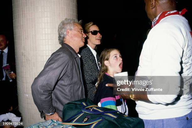 American television producer Bernard Sofronski, wearing a grey jacket, with his wife, American actress Susan Dey, who wears a black outfit with white...