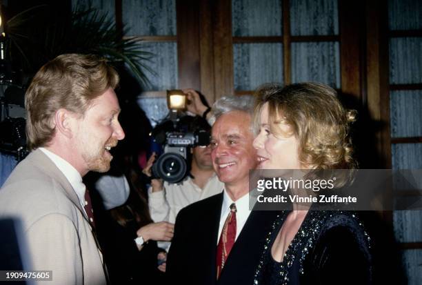 American television executive Warren Littlefield in conversation with American television producer Bernard Sofronski and his wife, American actress...