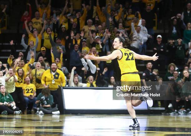 Guard Caitlin Clark of the Iowa Hawkeyes celebrates after scoring the game winning shot in the closing seconds of the second half against the...