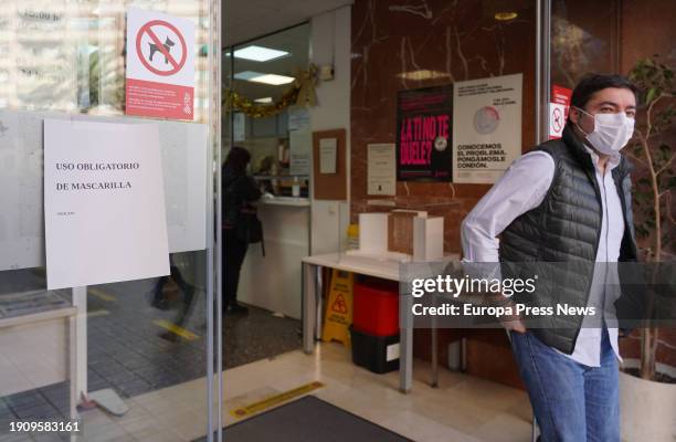 Person wearing a facemask as he leaves the Centre de Salut Chile, on January 5 in Valencia, Comunidad Valenciana, Spain. With an incidence of...