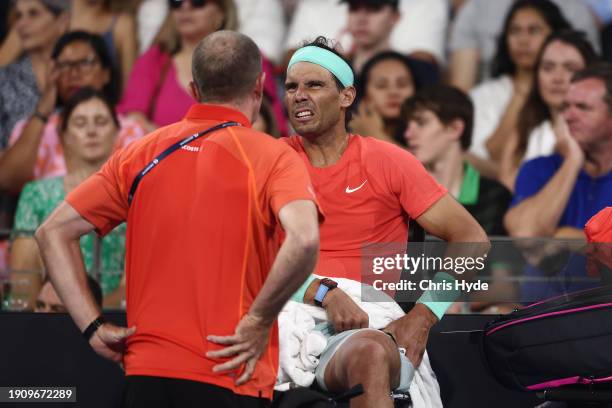 Rafael Nadal of Spain receives treatment in his match against Jordan Thompson of Australia during day six of the 2024 Brisbane International at...