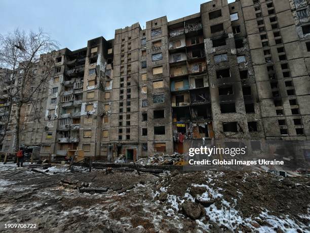 View of a damaged apartment building after a Russian missile attack on January 05, 2024 in Kyiv, Ukraine. After the Russian mass missile strike on...
