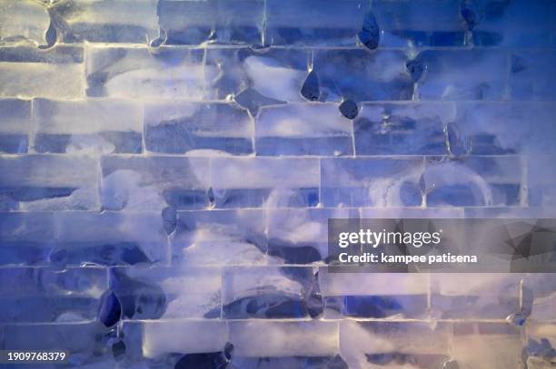 wall composed of bricks of ice, full frame - melting snowball stock pictures, royalty-free photos & images