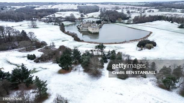 Photograph taken on January 8, 2024 shows an aerial view of Leeds Castle covered in snow in Maidstone, Kent, southern England.