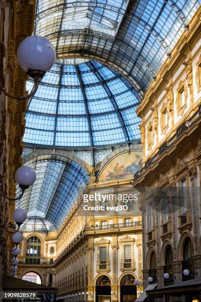 holidays in italy - inside the galleria vittorio emanuele ii in milan - milan fashion stock pictures, royalty-free photos & images