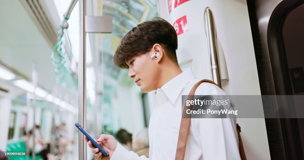 Man listen music with earbuds
