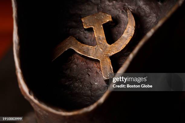 Newton, MA The boot contains a hammer and sickle symbol, as Putin's Russia recalls for Nancy Schon the old Soviet regime. Schon, the 95-year-old...