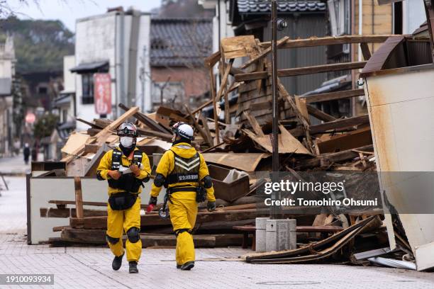Firefighters search for survivors in the aftermath of an earthquake on January 05, 2024 in Wajima, Japan. On New Year's Day, a series of major...