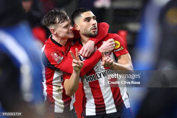 Neal Maupay of Brentford celebrates with teammate Keane Lewis-Potter after scoring their team's first goal during the Emirates FA Cup Third Round...