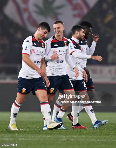 Albert Gudmundsson of Genoa CFC celebrates with teammates after scoring their team's first goal during the Serie A TIM match between Bologna FC and...