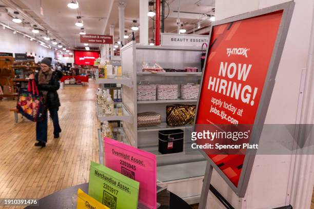 Now hiring' sign is displayed in a retail store in Manhattan on January 05, 2024 in New York City. As the American economy continues to outperform...