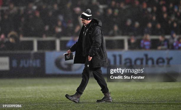 Falcons head coach Alex Codling walks across the pitch at half time during the Gallagher Premiership Rugby match between Newcastle Falcons and...