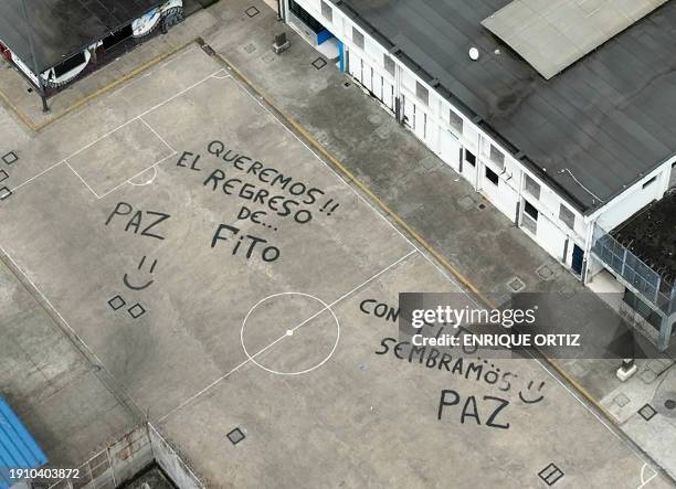 Aerial view showing messages regarding criminal gang Adolfo "Fito" Macias, written by inmates at the Regional 8 prison in Guayaquil, Ecuador, taken...