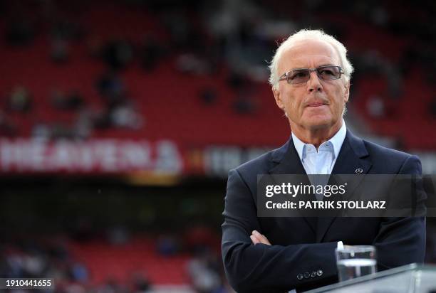 German football legend Franz Beckenbauer speaks on TV during the UEFA Champions League semi-final second leg football match between Manchester United...