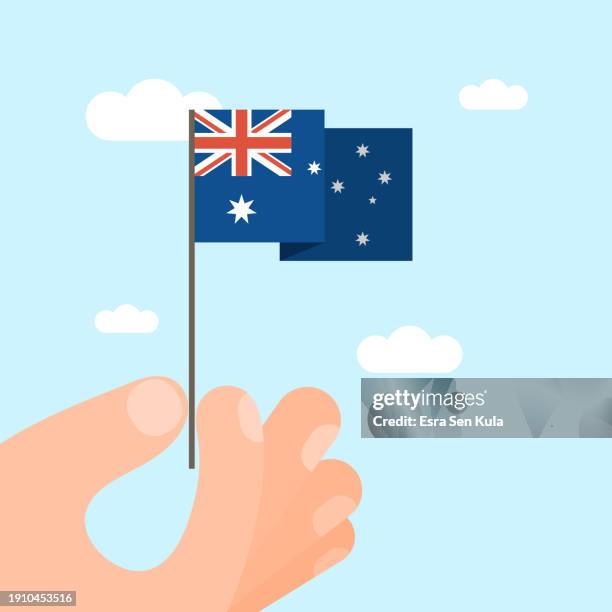 eine illustration einer tragbaren australischen nationalflagge. diese vektorillustration im minimalistischen stil eignet sich für die verwendung auf websites, webbannern, postern, mailing-vorlagen und sozialen medien. - australia day stock-grafiken, -clipart, -cartoons und -symbole