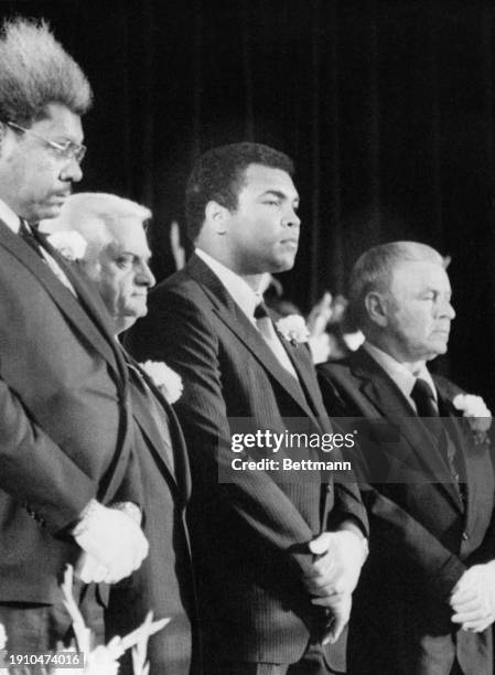 In attendance at boxer Joe Louis' memorial in Las Vegas are left to right: Don King, Caesars Palace President Harry Wald, Muhammad Ali, and Frank...