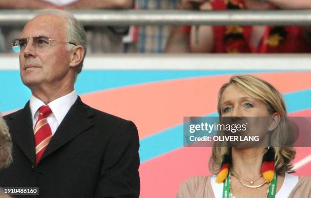 Franz Beckenbauer , chief of the World Cup Organising Committee and former German football great, and his new wife Heidrun Burmester attend the round...