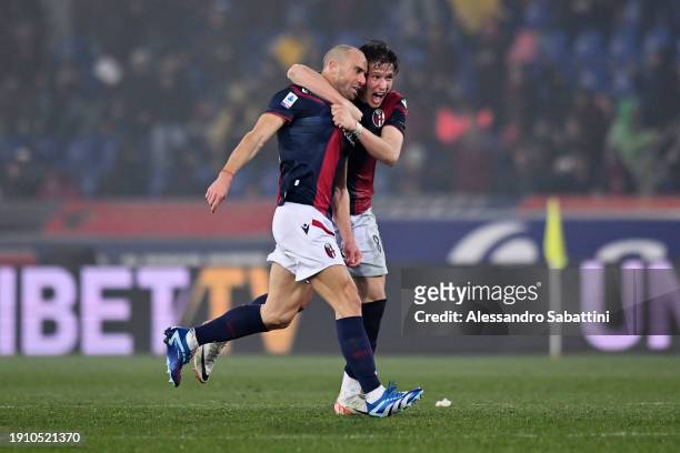 Lorenzo De Silvestri of Bologna FC celebrates with teammate Giovanni Fabbian after scoring their team's first goal during the Serie A TIM match...