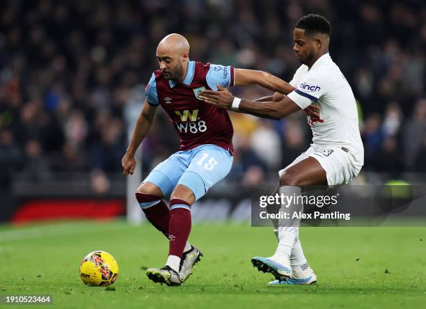 Nathan Redmond of Burnley is challenged by Ryan Sessegnon of Tottenham Hotspur during the Emirates FA Cup Third Round match between Tottenham Hotspur...