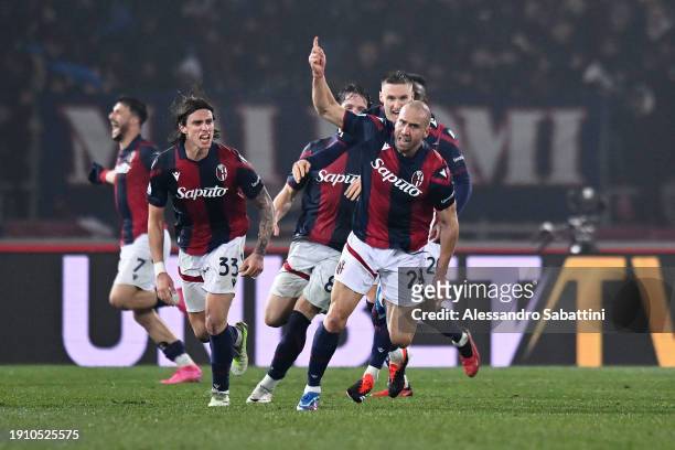 Lorenzo De Silvestri of Bologna FC celebrates with teammates after scoring their team's first goal during the Serie A TIM match between Bologna FC...
