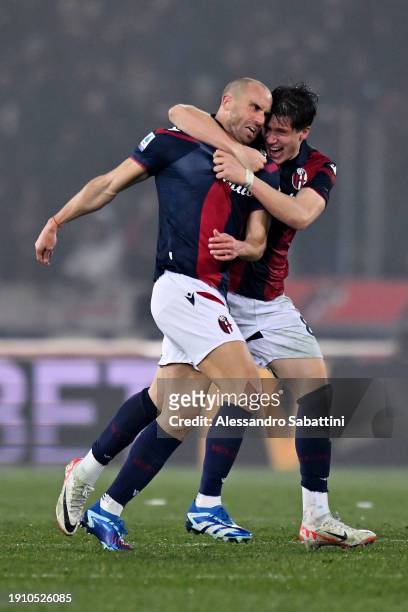 Lorenzo De Silvestri of Bologna FC celebrates with teammate Giovanni Fabbian after scoring their team's first goal during the Serie A TIM match...