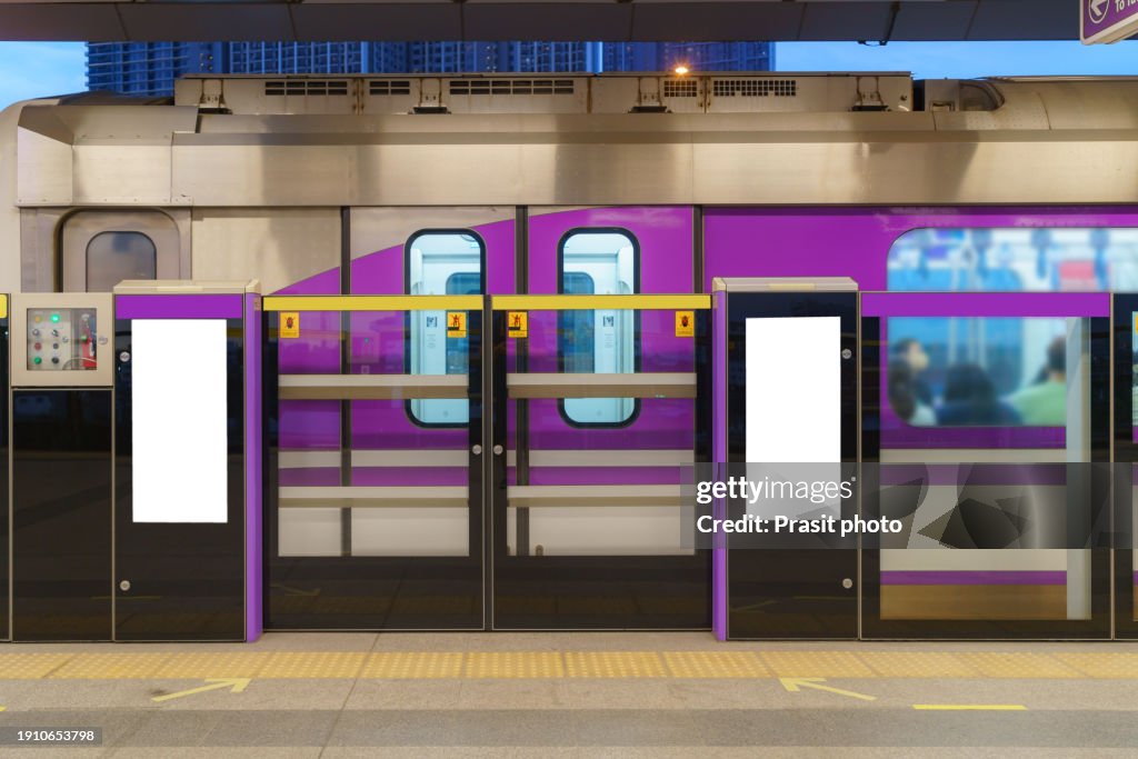 White billboard mock up is located on subway or train station to advertise