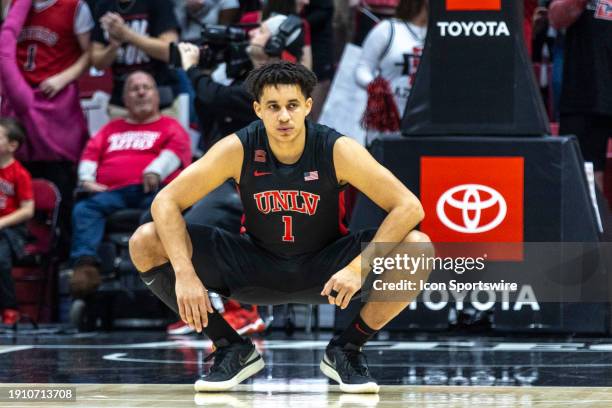 Forward Jalen Hill crotches before the tipoff in the first half of a college basketball game between the UNLV Runnin' Rebels and the San Diego State...