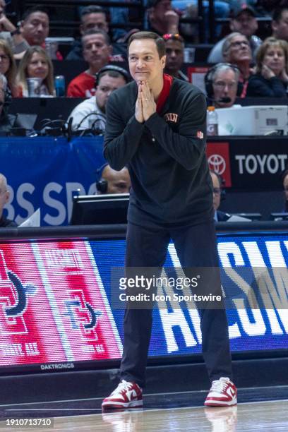 Head coach Kevin Kruger reacts courtside in the second half of a college basketball game between the UNLV Runnin' Rebels and the San Diego State...