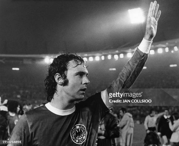 German football player Franz Beckenbauer waves to the spectators after winning the World Cup 1974 final football match against Sweden, in Dusseldorf,...